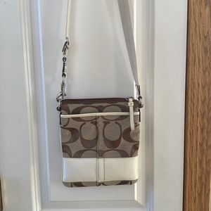 Coach purse with adjustable shoulder strap